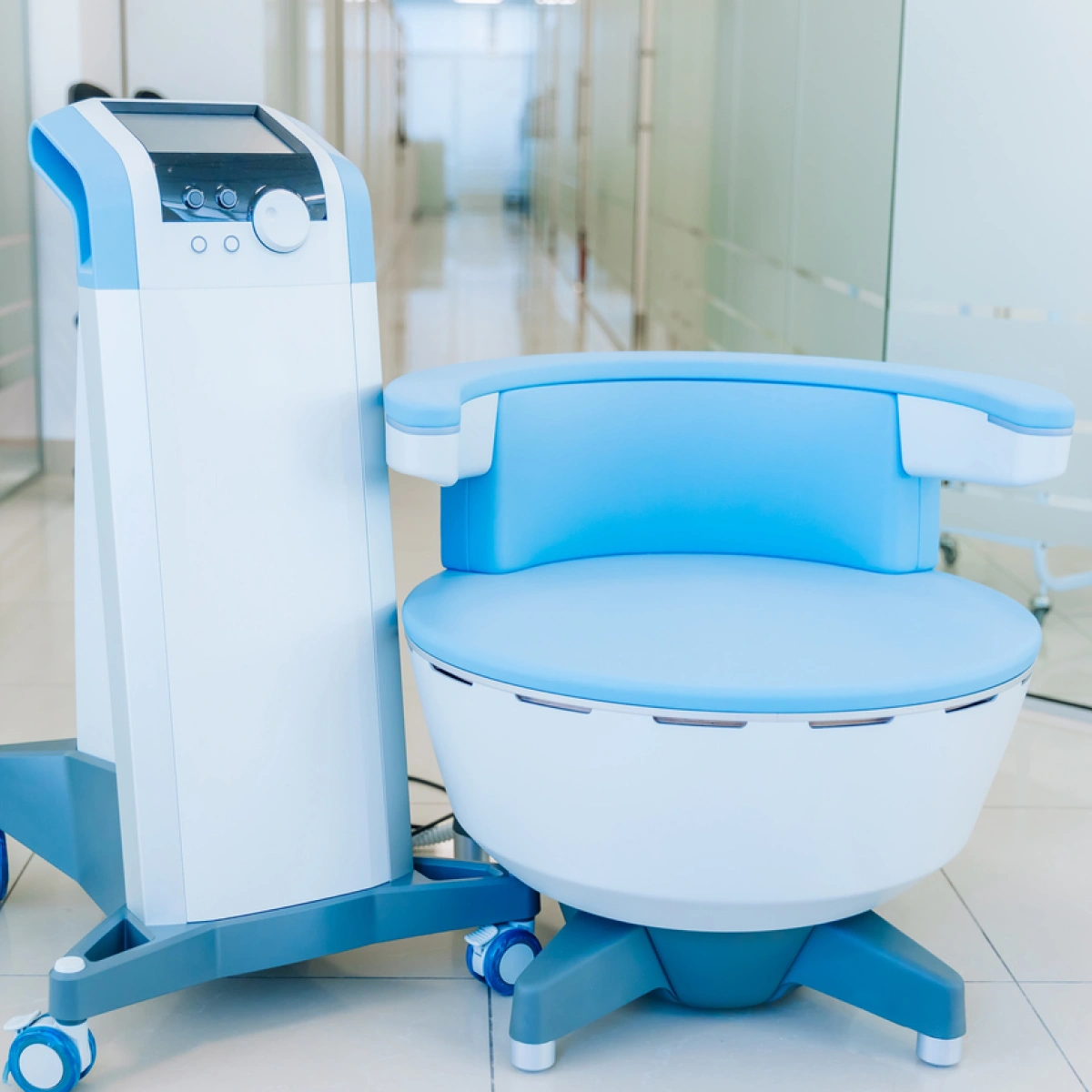 A blue and white Electronic Chair Scale with armrests, next to a a digital display stand